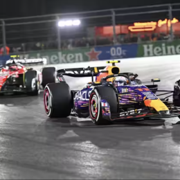 An image of Sergio Perez of Oracle Red Bull Racing, right, and Charles Leclerc of the Scuderia Ferrari team compete in the Las Vegas Grand Prix on Nov. 19, 2023.